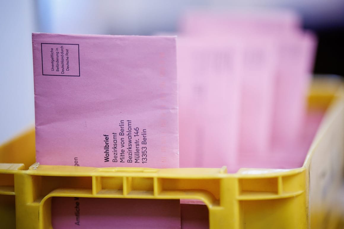 12839439-scaled-1 Voters cast ballots in postal voting center ahead of German Federal Election